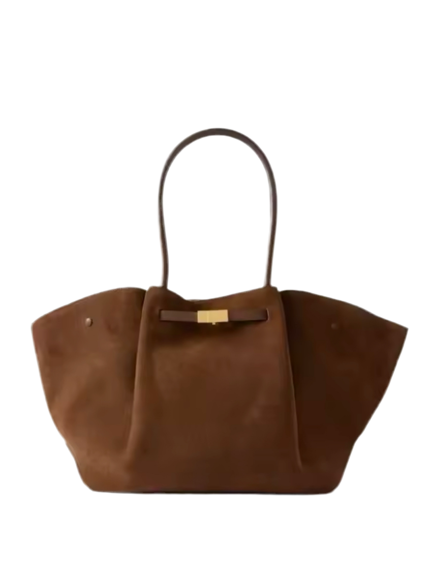 Elegante, große Handtasche mit luxuriöser Wildleder-Optik und goldenen Details. Verfügbar in Schwarz, Dunkelbraun und Cognacbraun. Perfekt für einen stilvollen, zeitlosen Look – ideal für Business und Alltag.
