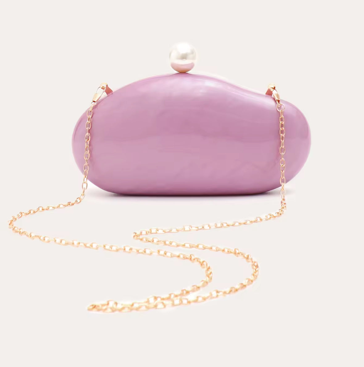 Rosa Clutch mit Perlenverschluss