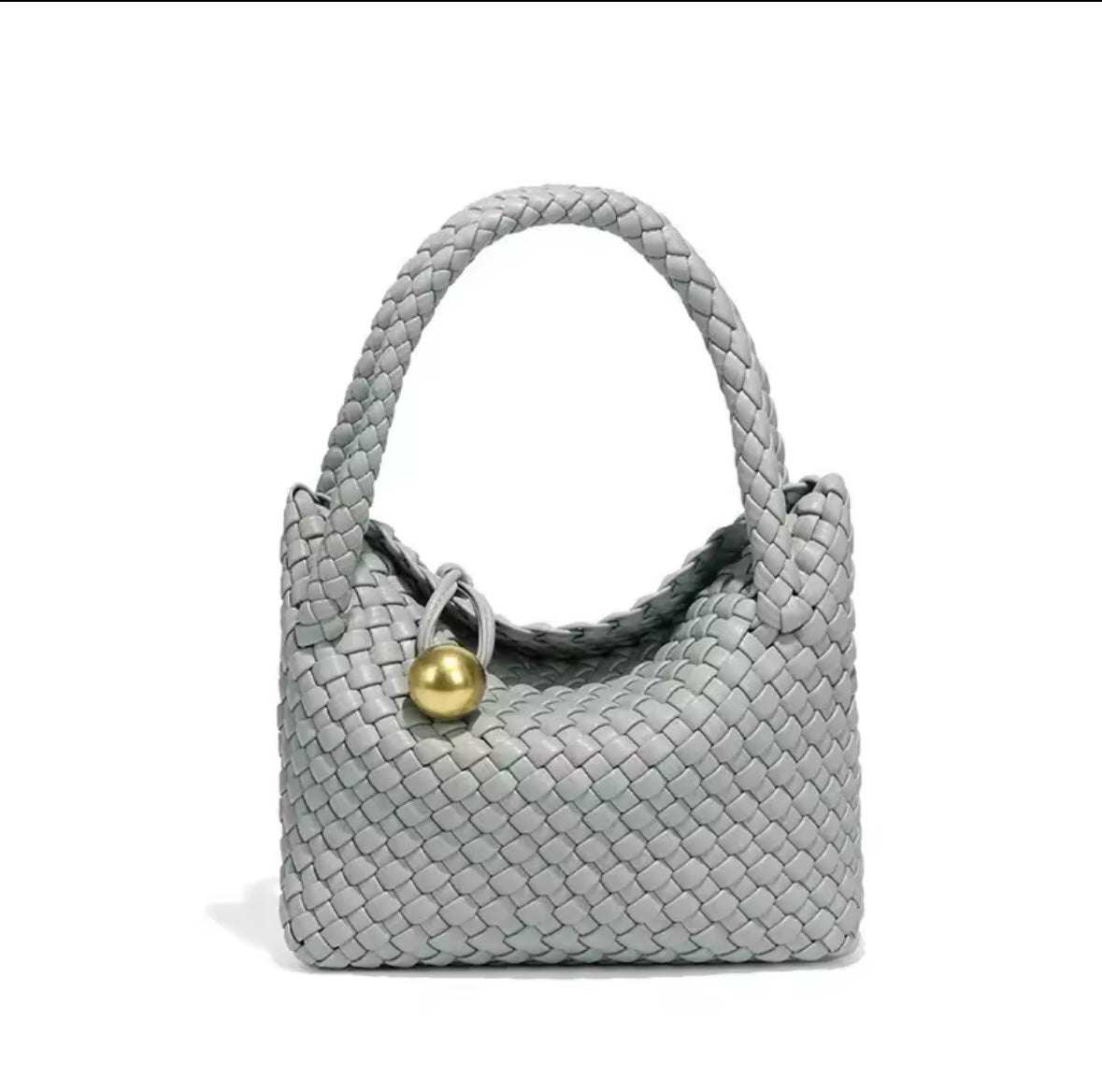 Luxuriöse, handgeflochtene Ledertasche mit goldener Kugelverzierung. Das elegante Design verleiht jedem Look einen Hauch von Raffinesse. Verfügbar in verschiedenen Farben, darunter Schwarz, Braun, Grün, Bordeaux, Silber und Pastelltöne.
