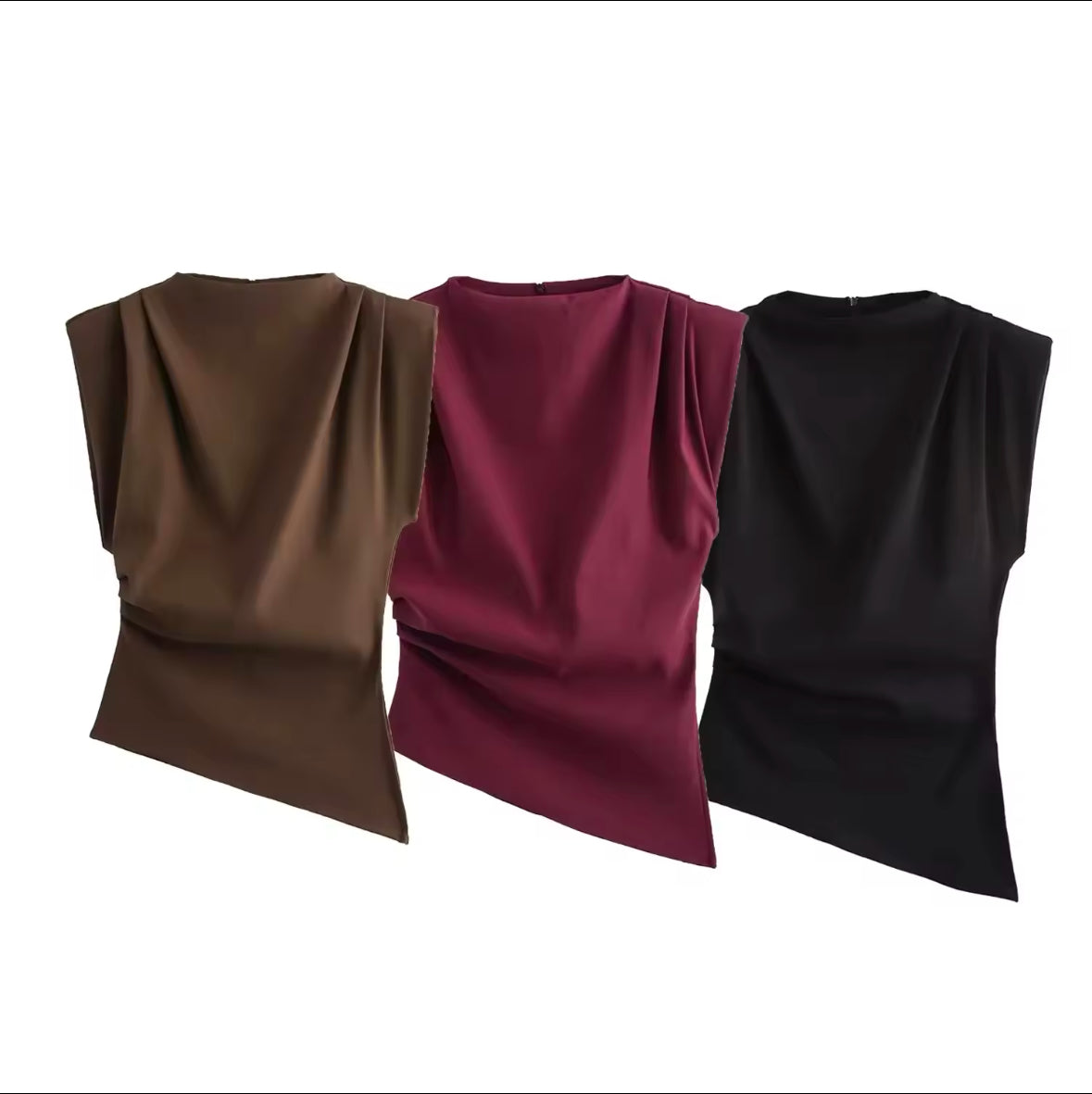 Ärmelloses, asymmetrisches Top mit elegantem Faltenwurf in drei Farben – Braun, Burgunderrot und Schwarz. Perfekt für einen stilvollen und modernen Look.