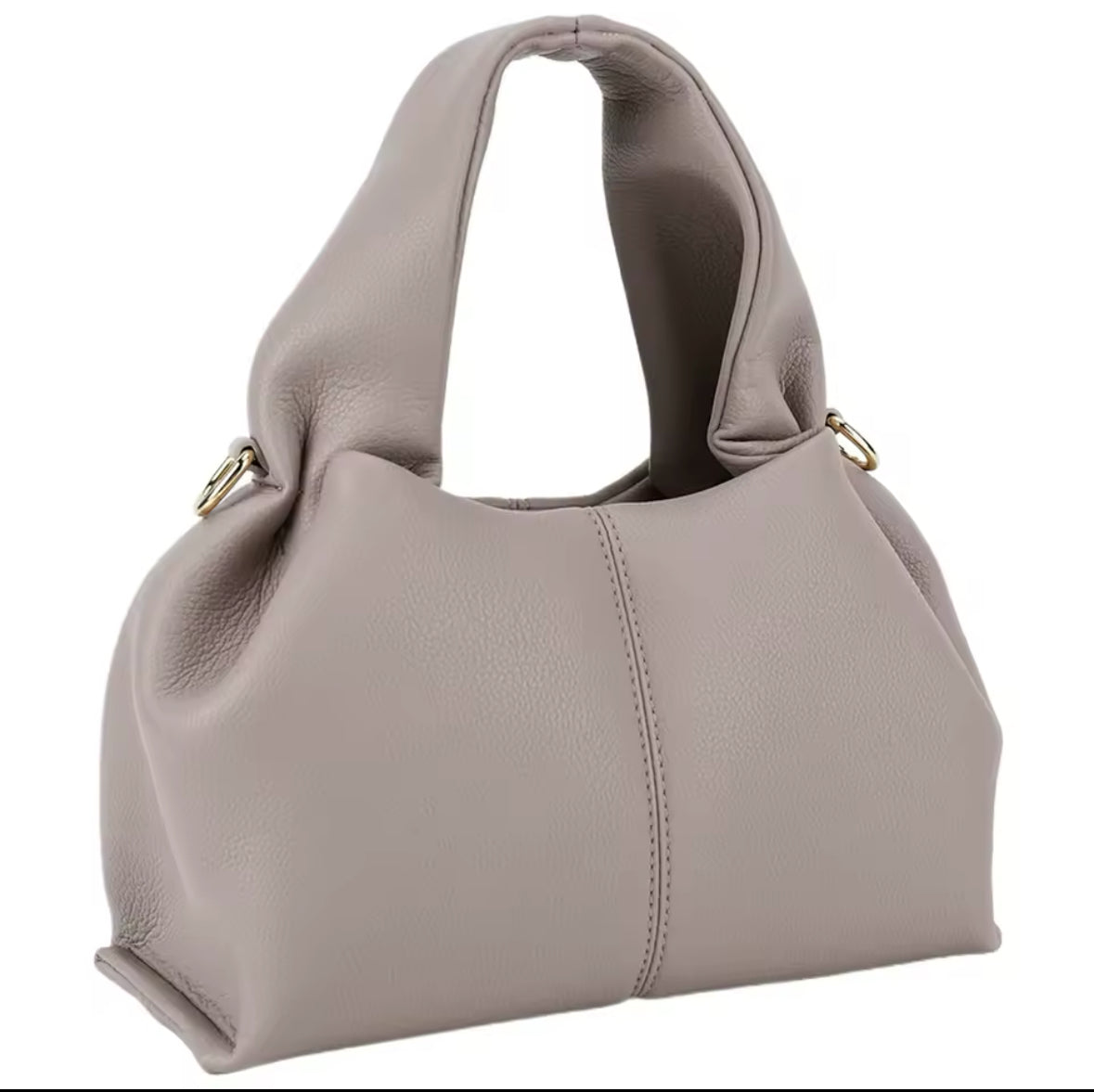 Minimalistische, weiche Handtasche aus hochwertigem veganes Leder mit elegantem, geschwungenem Design. Verfügbar in den Farben Elfenbein, Schwarz, Camel und Taupe – perfekt für einen modernen und zeitlosen Look.