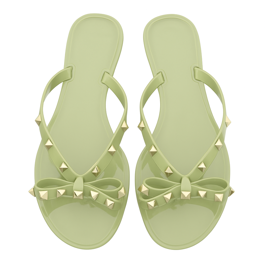 Pistaziengrüne Jelly Flip-Flops mit goldenen Nieten und Schleife