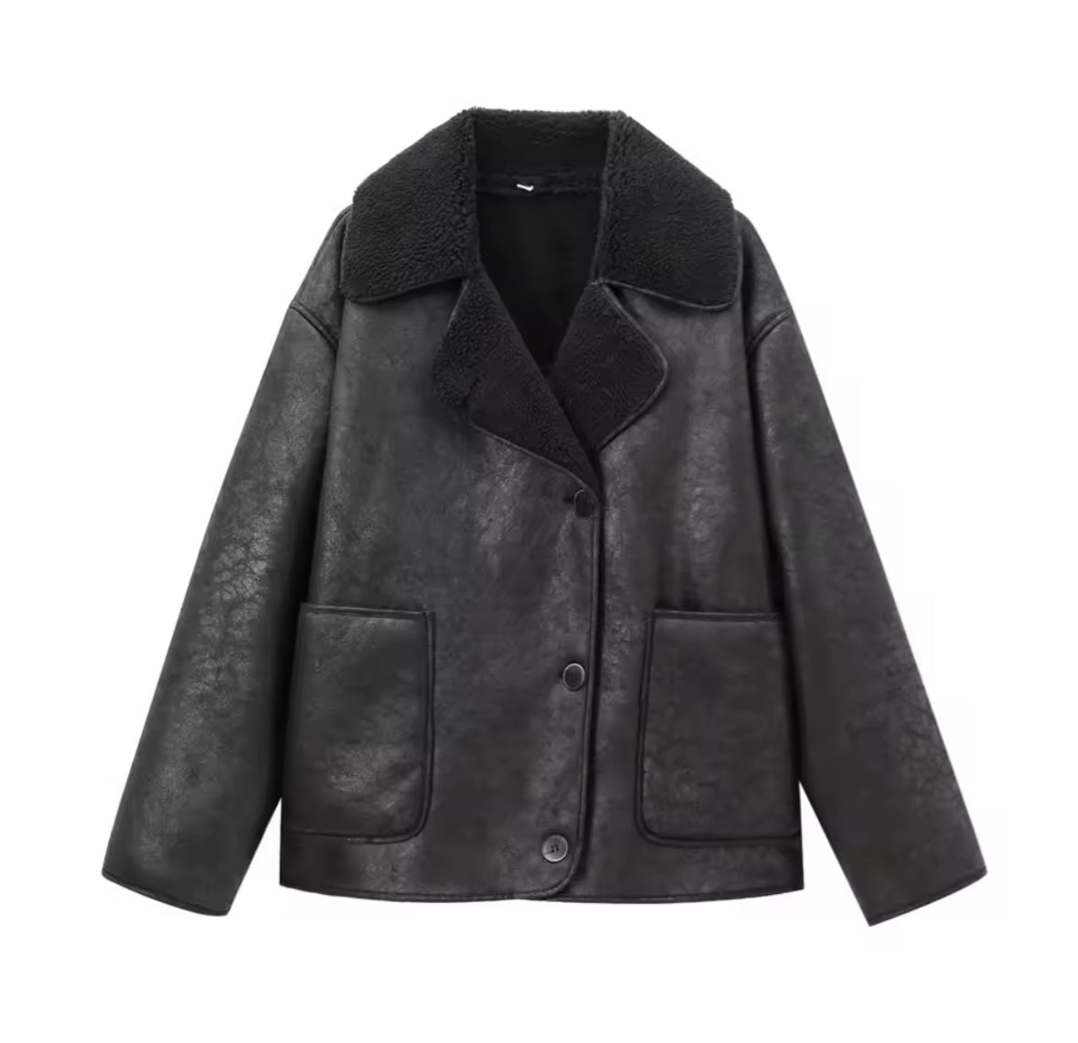 Stylische Damenjacke Mira aus Kunstleder mit Shearling-Futter in Schwarz oder Dunkelbraun, Oversize-Schnitt und großen Taschen – perfekt für kalte Tage.