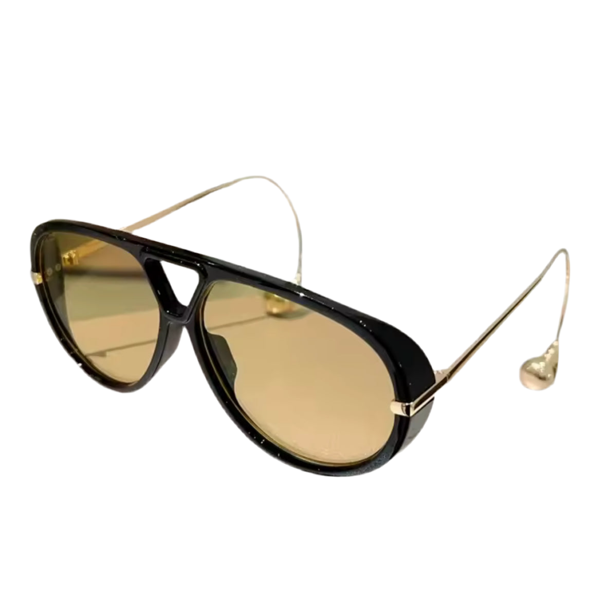 Moderne Sonnenbrille im Statement-Design mit tropfenförmigen Endstücken an goldenen oder silbernen Metallbügeln. Erhältlich in Schwarz, Blau, Braun, Gelb und Schildpatt – stilvoll, auffällig und hochwertig.