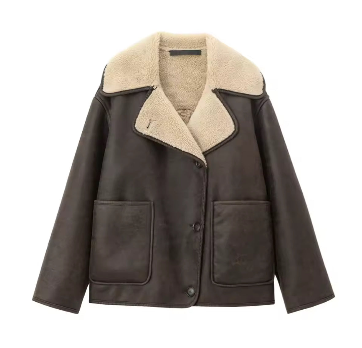 Stylische Damenjacke Mira aus Kunstleder mit Shearling-Futter in Schwarz oder Dunkelbraun, Oversize-Schnitt und großen Taschen – perfekt für kalte Tage.